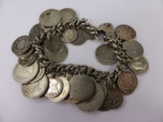 A Lady's Solid Silver Hallmarked Coin Bracelet, the bracelet having a miscellaneous collection of