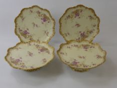 A Pair of Blushware Cake Stands, hand painted with floral sprays with gilt highlights and