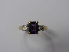 A Lady's 18 ct Gold Amethyst and Diamond Ring, size L, approx 3.8 gms, amethyst 7 x 5 mm, dias 2 x