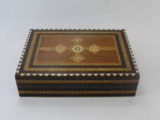 A Folding Chess Set, the interior with four compartments for the chess pieces, the interior of