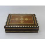 A Folding Chess Set, the interior with four compartments for the chess pieces, the interior of