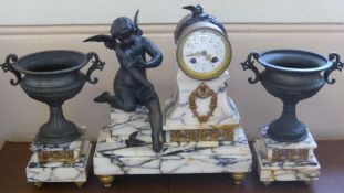 A 19th Century French Marble Mantel Clock and Garniture, decorated with a seated putti, the enamel