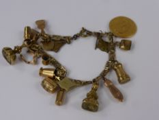 A Gold Metal Charm Bracelet, together with a miscellaneous collection of miniature charms, some 9 ct