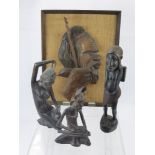 A Collection of Carved Tribal Figures, including two carved wooden feminine figures, one seated