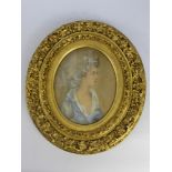 Two Oval Water Colour Portraits of Lady Amory, presented in gilt wood frames, approx 31 x 16 cms.