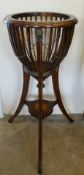 A Regency Style Wooden Plant Stand, with decorative inlay, approx 84 cms high.