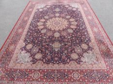 A Contemporary Louis de Poortere, woollen middle eastern style carpet, the carpet having a