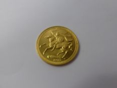 A Queen Elizabeth II Solid Gold Full Sovereign (Isle of Man) dated 1973. (gc)