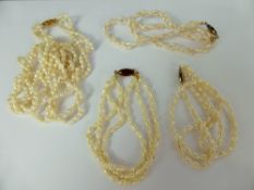 Miscellaneous Freshwater Pearls, including one three strand necklace, approx 58 cms, one two