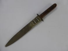 An Italian Fascist Officer's Commando Knife 1930, the knife having wooden handle with metal