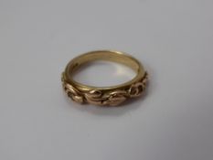 A Lady's Welsh Gold 9ct White and Rose Gold Wedding Ring, the ring having lily design to top, 4.4