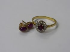 A Lady's 18 ct Yellow Gold Ruby and Diamond Ring, size M, rubies 4.6 x 4.10 mm, dia wt approx 15