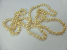 A Lady's Baroque Pearl Necklace, the pearls approx 7mm, approx 110 cms.