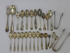 A Quantity of Silver Teaspoons, including a set of eight coffee spoons (60 gms), six souvenir spoons