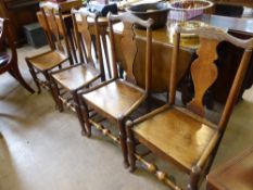 A Set of Four Antique Oak Farmhouse Dining Chairs, the chairs having turned front stretchers on hoof