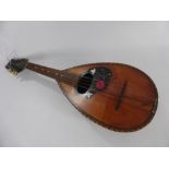 A Vintage Neapolitan Guiseppe Quaglia Mandolin, circa 1900 the eight string mandolin with decorative