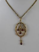 A Lady's Edwardian Pendant, suspended on 9 ct gold chain.