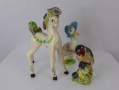 Basil Matthews, Pottery Figurine of a Foal, marks to base together with a Beswick figurine of