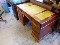 A Reproduction Office Desk, four short drawers to either side and one single central drawer, mustard