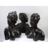 Three Rosewood Tribal Busts, depicting two feminine figures with elaborately braided hair together