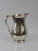 A Silver Milk Jug, London hallmark, dated 1937, mm Edward Barnard & Son, approx 174 gms