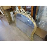 A Circa 19th Century Swan Neck Over Mantel Mirror, the mirror having a shell and laurel carved top