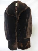 A Lady's Vintage Beaver Lamb Coat, size medium.