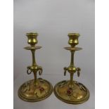 A Pair of Antique Brass Candle Sticks, the candle sticks with raised insects (beetles) decorated