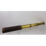 A Vintage Dolland (London) Brass and Leather, four draw telescope.