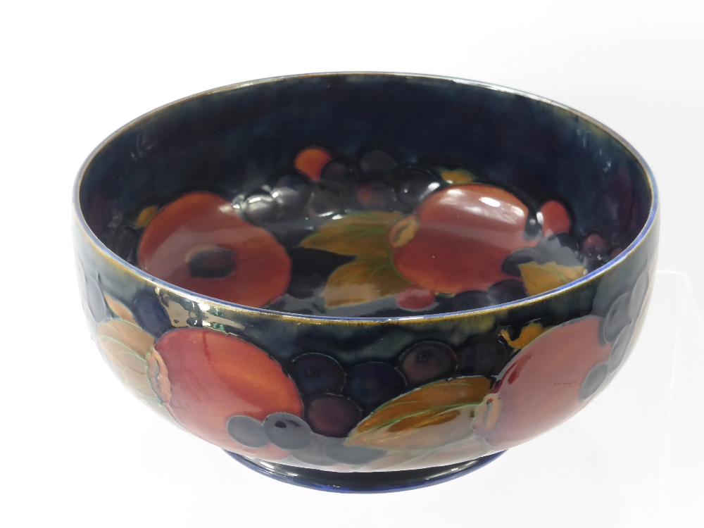 William Moorcroft 'Pomegranate' Fruit Bowl, of circular form, on green blue ground, factory marks to - Image 2 of 2