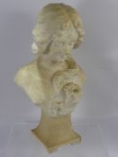 A Cream Carrara Marble Bust of a Modest Young Woman, with flowing locks over one shoulder and