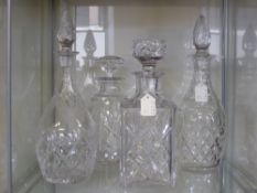 A Collection of Glass Four Cut Glass Decanters and Stoppers.