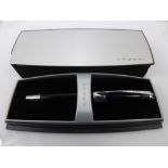 A Contemporary Cross Black and Chrome Ink Pen, the pen having a white gold 750 knib, presented in