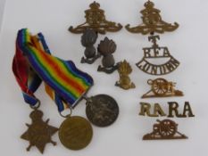 A WWI Trio of Medals, named to Gnr A McClure RFA No. 2362 with period badges etc.