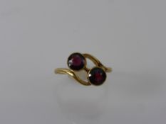 A Lady's 9 - 14 ct Gold and Spinel/Garnet Ring, approx 3 gms, size L.