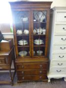 A Reproduction Mahogany Book Case, the book case having an astral glaze top and the chest of drawers