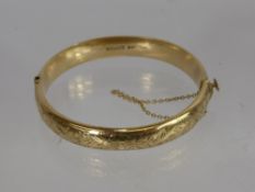 A Lady's 9 ct Gold Bangle