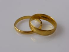 Two 22 ct Gold Wedding Rings, sizes Q and S, approx wt 7.2 gms.