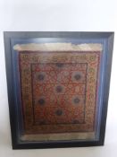 An Antique Silk and Fine Wool Prayer Carpet, with floral surround and a geometric central panel with