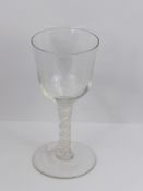 An Antique Twisted Ribbon Stem Wine Glass, approx 18 cms