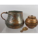 An Antique Copper Ale Jug, approx 13 cms high together with a sugar bowl and cover and a copper