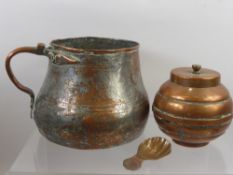 An Antique Copper Ale Jug, approx 13 cms high together with a sugar bowl and cover and a copper