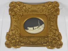 An Antique Bone Silhouette Carving, depicting cattle in a field, approx 9 x 7 mm, the silhouette