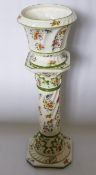 A Mid 20th Century Jardiniere and Stand, by the Italian Naples factory, with polychrome floral