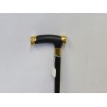 An Early 20th Century Gold Capped Ebony Walking Stick, makers mark J. Howell & Co Ltd, 1910-1916,