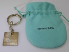 A Silver Tiffany & Co Keyring, in the original pouch and retail box.