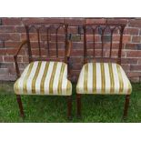 Eight Hepplewhite Style Dining Chairs, including two carvers, upholstered in a Regency stripe.