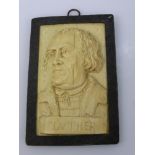 An Antique Ivory Plaque, depicting Martin Luther, approx 10 x 7 cms.