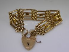 A 9 ct Yellow Gold Gate Link Bracelet, the bracelet having heart shaped clasp, approx wt 28.5 gms.