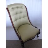 A Victorian Slipper Chair, mahogany frame on carved feet, with celadon green upholstery.